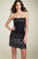 This sequin strapless dress has varying sizes of sequin, that REALLY grabs the light. $198 available at Nordstrom.com